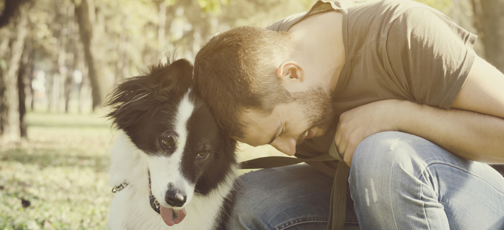 Dog and male owner